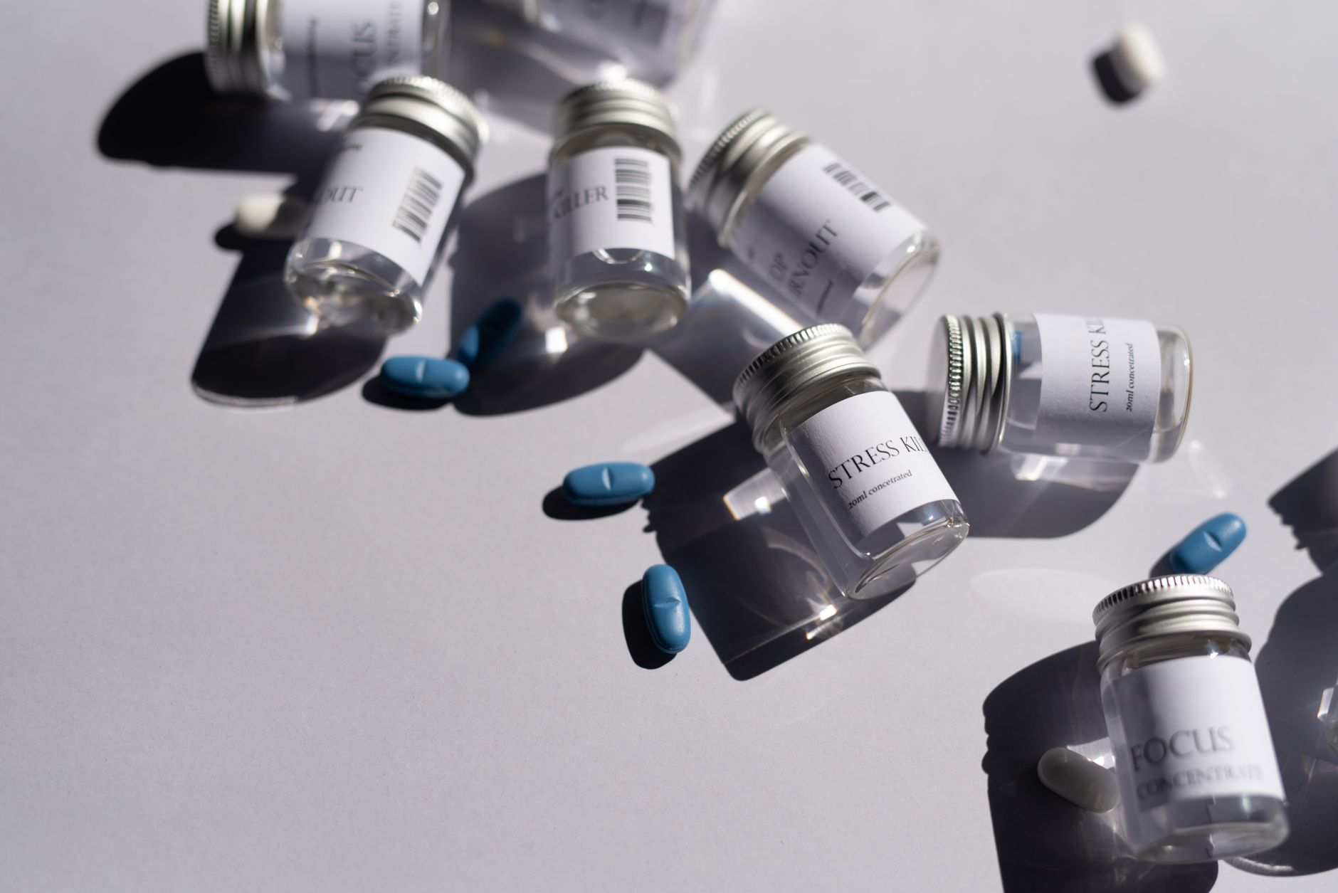 Prescription skincare bottles and tubes laid out on marble — prescription skincare UK NHS dermatology route